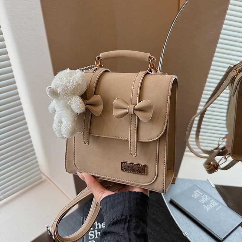 

Ретро сумка-мессенджер женская осень и зима новая нишевая бант многофункциональная высококлассный рюкзак рюкзак