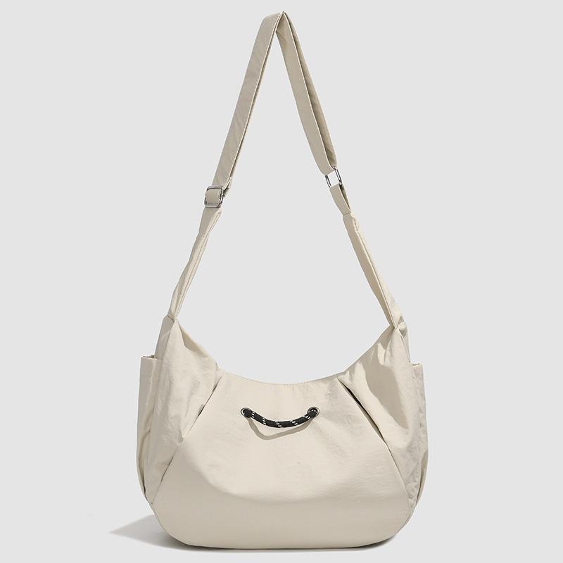 

Lightweight dumpling bag men s and women s new casual versatile work commuter messenger bag travel shoulder bag