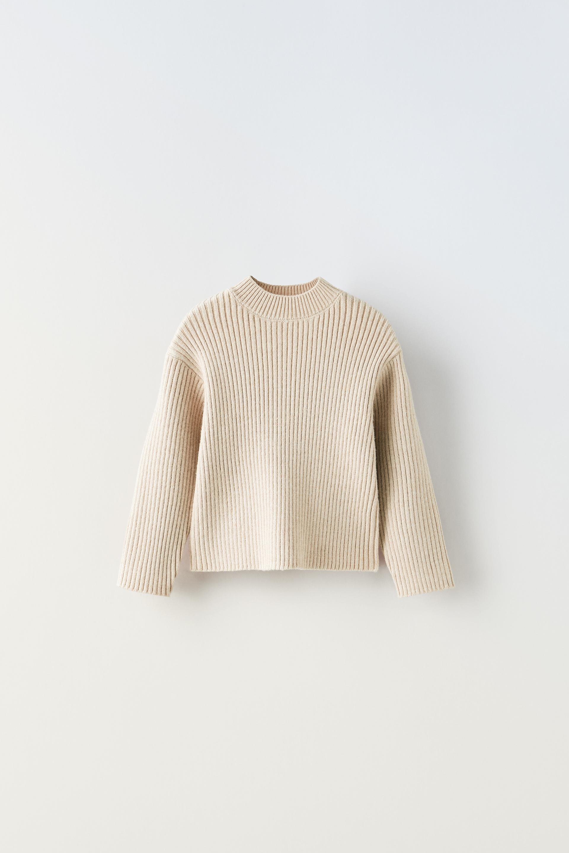 

ТРИКОТАЖНЫЙ СВИТЕР В РЕБРИКУ