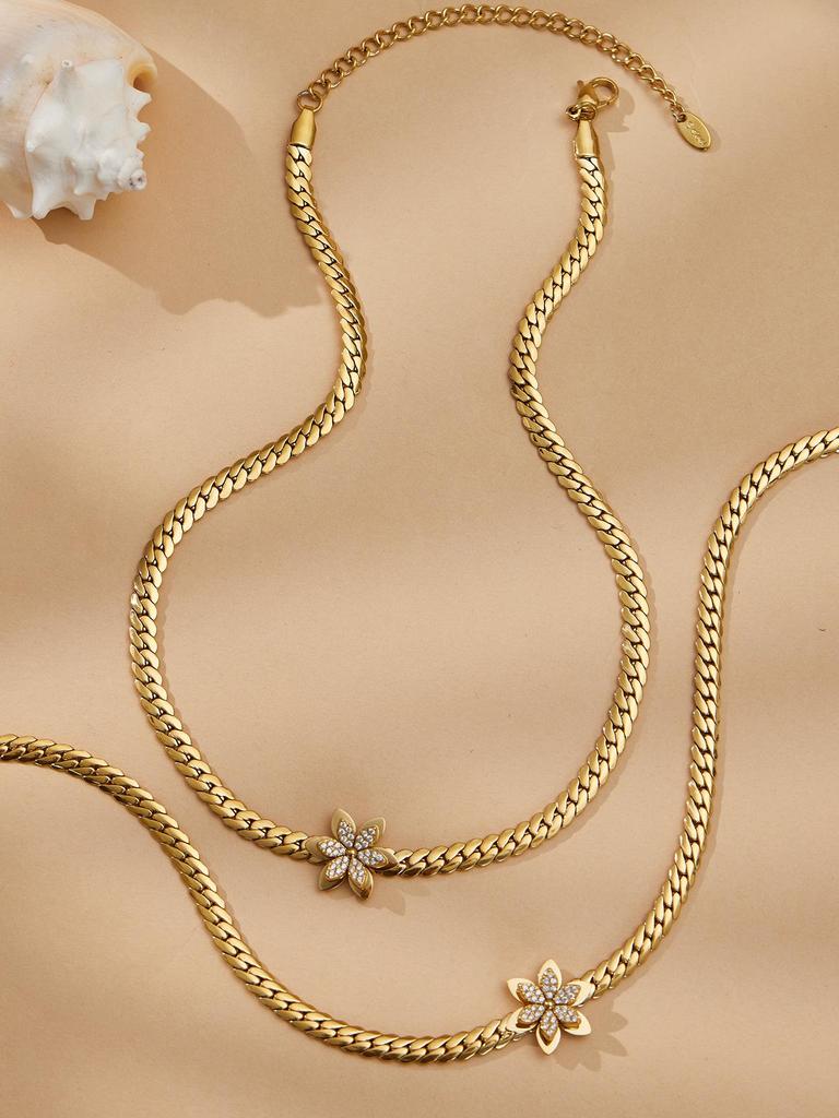 Exquisite 18k Gold-Plated Zircon Flower Jewelry Set: Stackable Stainless Steel Bracelet and Necklace.