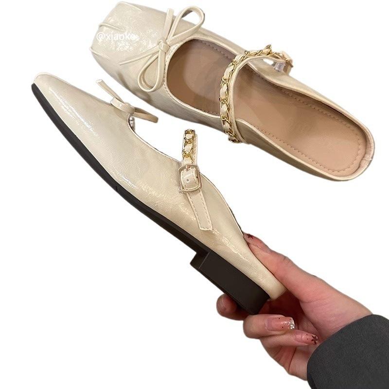 XINZHOU Xiaoxiangfeng główka torby półkapcie damskie odzież wierzchnia 2025 wiosna i lato nowe francuski temperament kapcie Muller