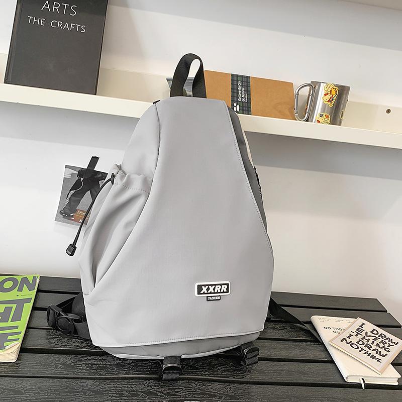 New Sports Wind Riding Diagonal Shoulder Bag Motorcycle Bombing Campus Portable Handsome Backpack Large Capacity Backpack.