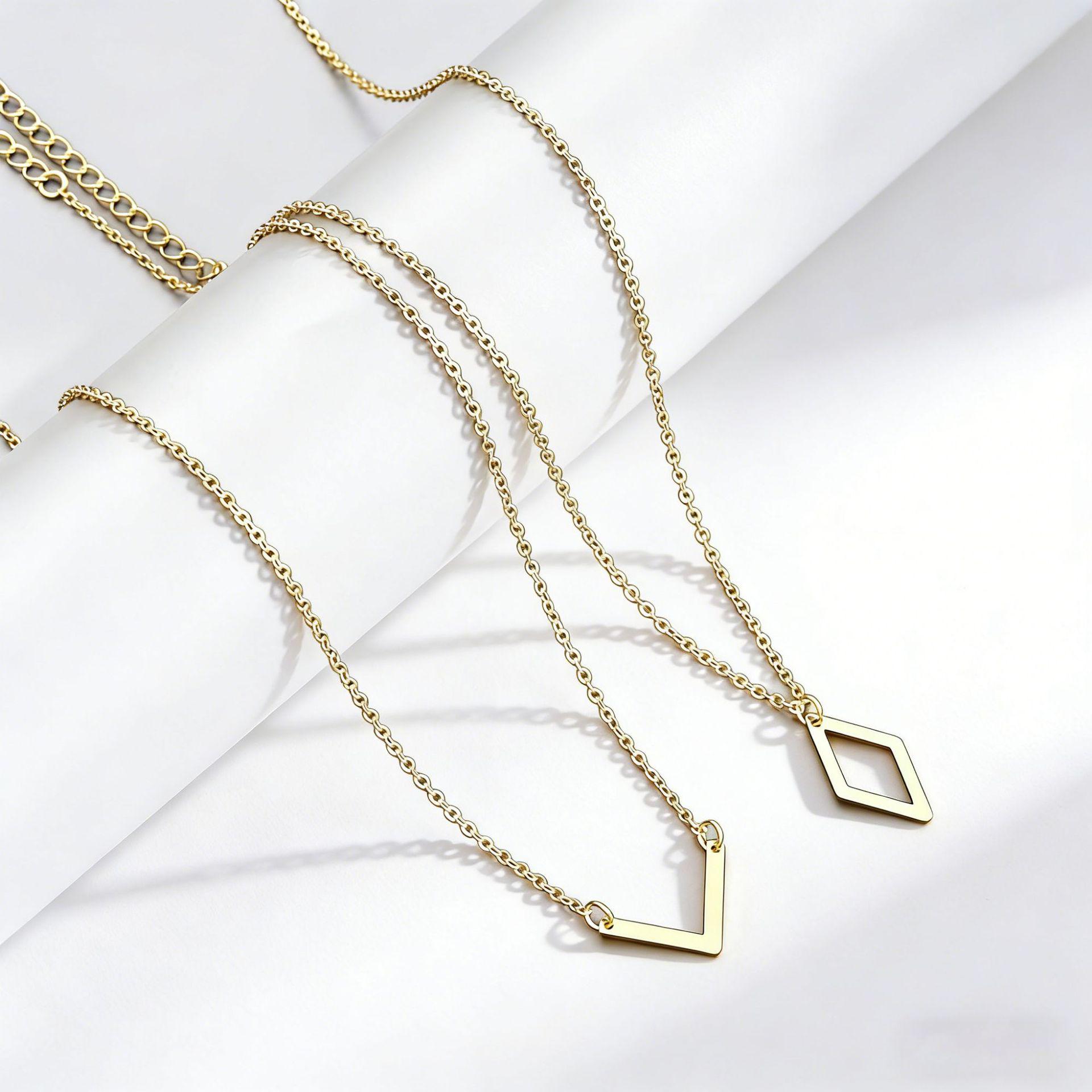 Современный геометрический набор из двух подвесок - ромбы V-образной формы для женщин