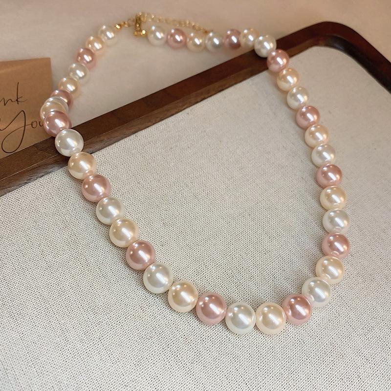 Fashion versatile color matching pearl necklace retro niche high-end sense collarbone chain personality light luxury design sense necklace women