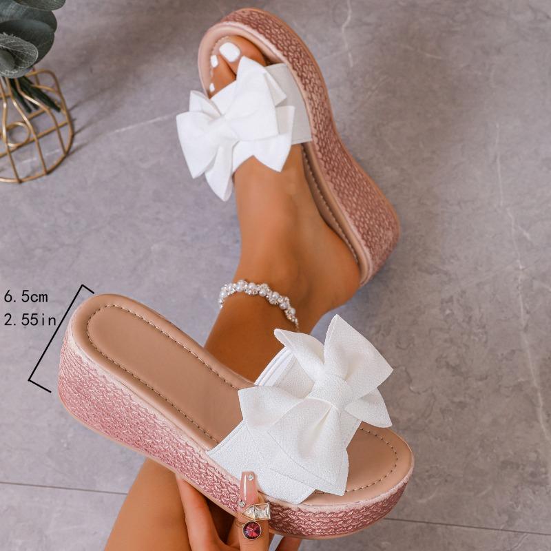 New large size wedge heel bow one-word slippers women's cloth surface thick-bottomed sponge cake beach cool slippers