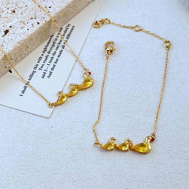 Elegancki Zestaw Naszyjnik & Bransoletka z Żółtą Kaczką Inkrustowaną Cyrkoniami