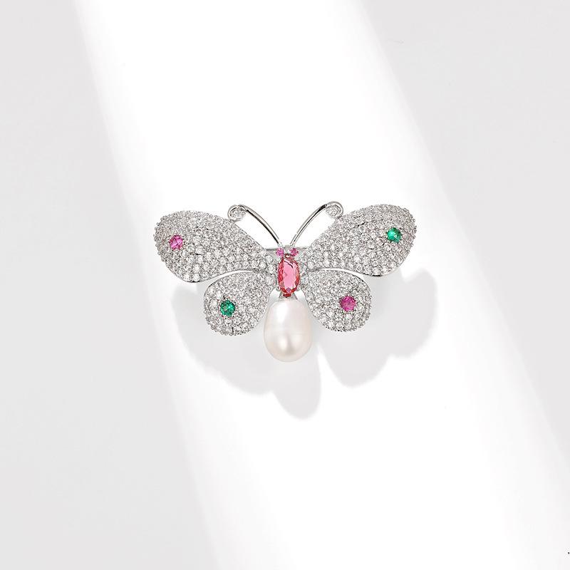 Elegant Zircon Butterfly Brooch with Freshwater Pearl Pin