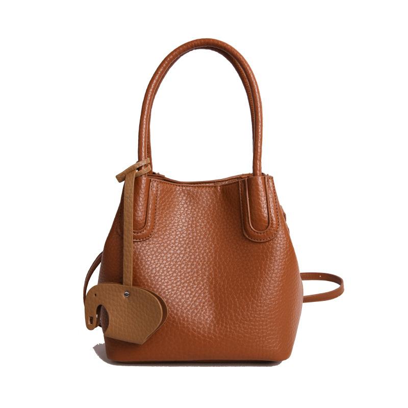 

Textured bubble leather shoulder bag women s new fashion bucket bag women s casual shoulder handbag