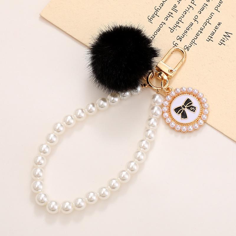 Schicke Perlenblumen-Anhänger Handyhülle & Handtaschenanhänger für Damen