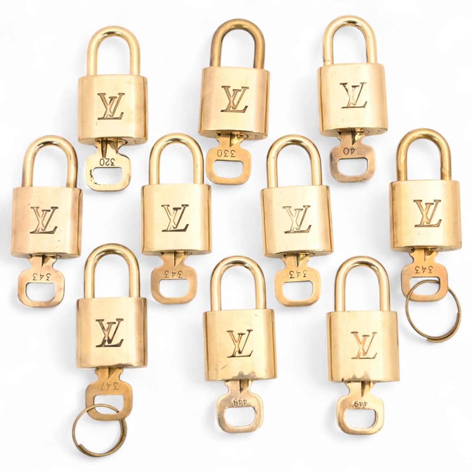 

Auth LOUIS VUITTON Padlock Set of 10 with Keys Metal set5519se