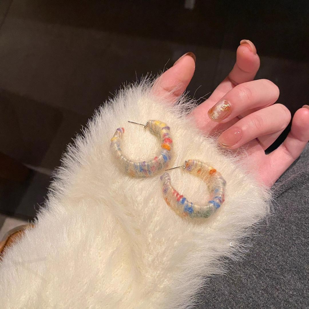 

Autumn and winter rainbow wool earrings Korean niche design sense cute earrings earrings fashion temperament new models