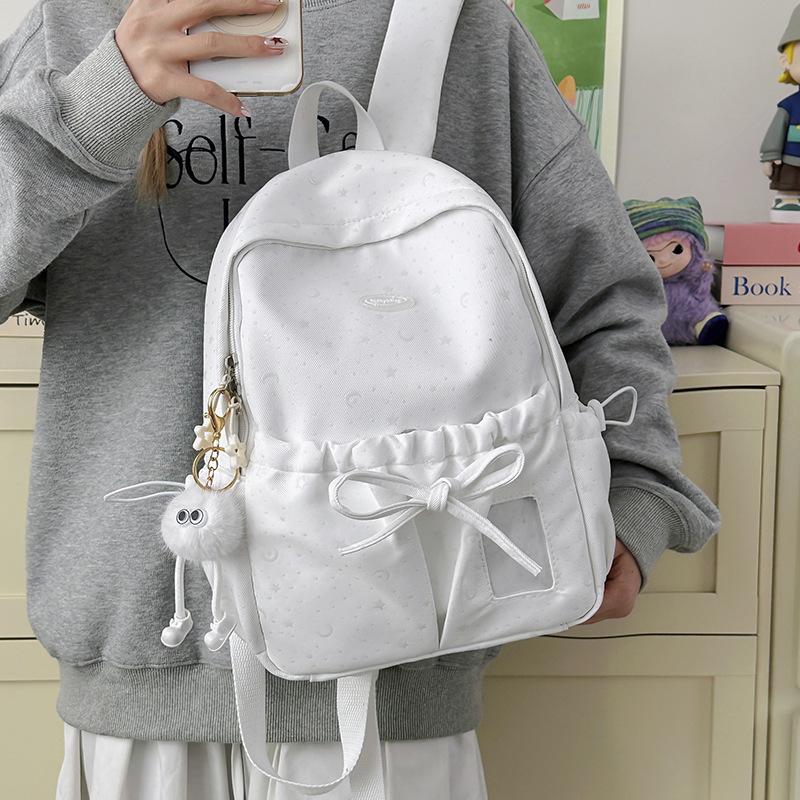 Schoolbag bow schoolbag female junior high school student star Korean version niche ins backpack college student computer bag micro pain bag