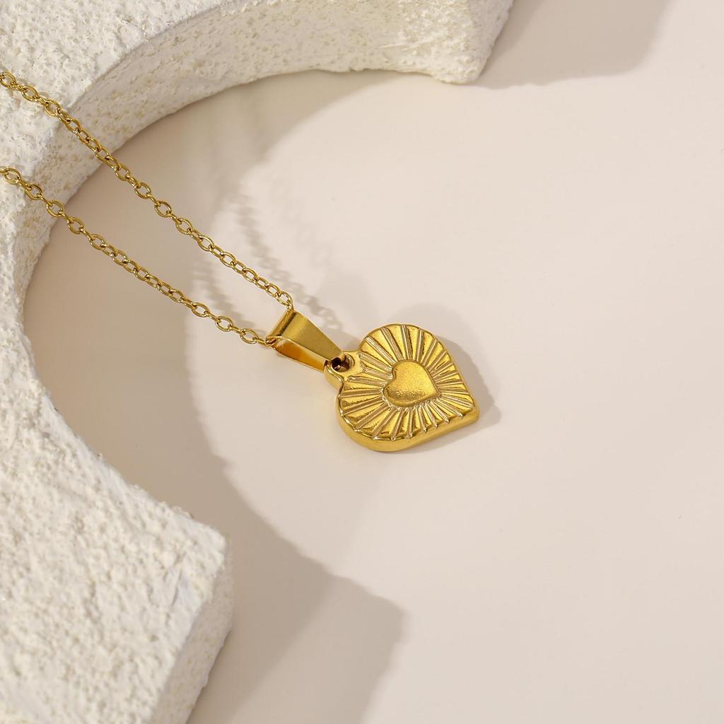 Golden Heart Clavicle Necklace with Radial Pattern In Stainless Steel