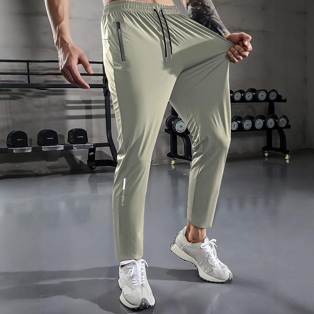 Oddychające Spodnie Dresowe Męskie Plus Size Casualowe dla Mężczyzn Spodnie do Treningu Szybkoschnące Proste Elastyczny Pas Koreański Klasyczny Sportowe