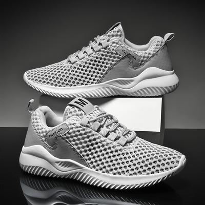 Prodyšné a lehké běžecké boty pro muže Síťované tenisky absorbující pot s dutým designem