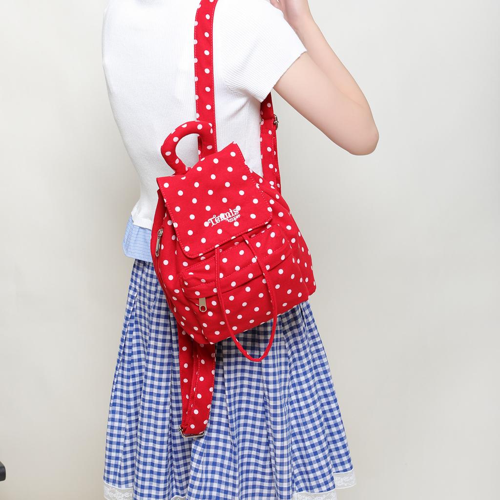 A Canvas Backpack with Polka Dots and A High Level of Appearance