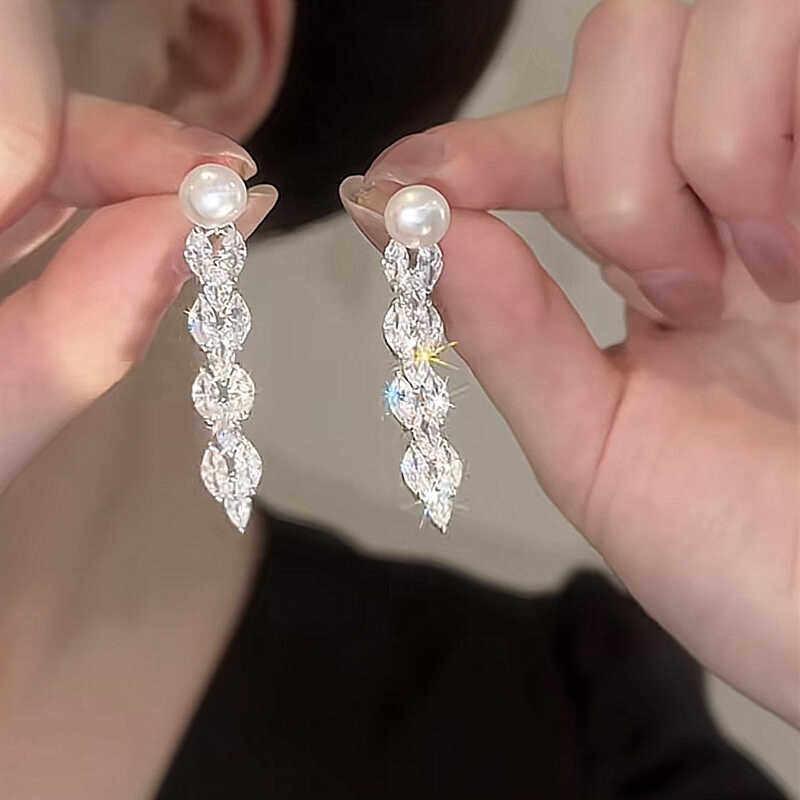 Light luxury temperament pearl tassel long earrings 111 silver needle design high-end earrings earrings 925 silver needle