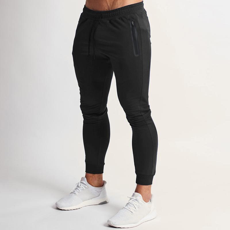 Frühling und Sommer Neue einfarbige Fitnesshose Lässige elastische Sporthose Herrenmode