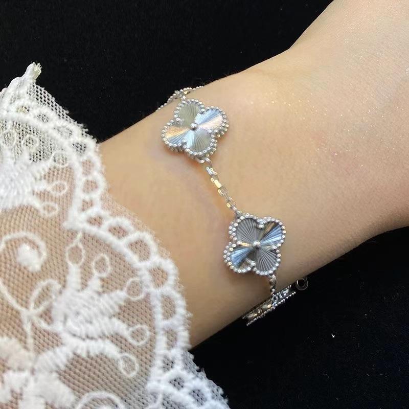 Bracelet trèfle à quatre feuilles, léger, luxueux, design de niche féminin, bracelet porte-bonheur à cinq fleurs