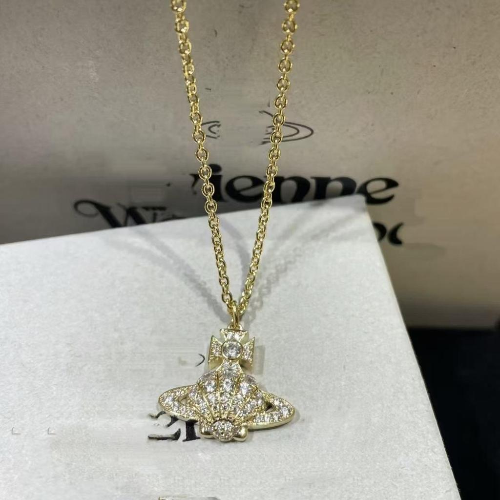 Vivienne Westwood Diamond Shell Saturn Jewelry Set: Necklace, Bracelet, and Earrings – Women's Luxury Versatile Collection.