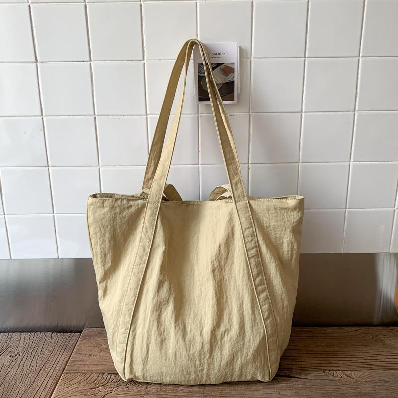 

2025 осень новая японская нейлоновая сумка через плечо для通勤, большая вместимость, ручная сумка, легкий рюкзак для покупок, женская хаки