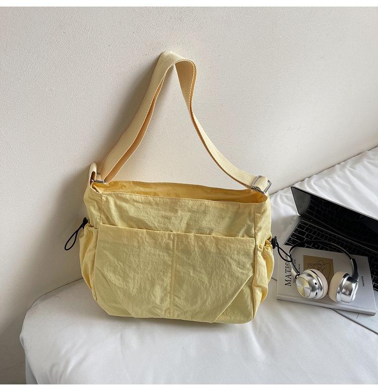 

Nylon cloth casual tote bag women s bag 2025 new large-capacity simple lightweight crossbody bag Korean version of shoulder bag trend жёлтый