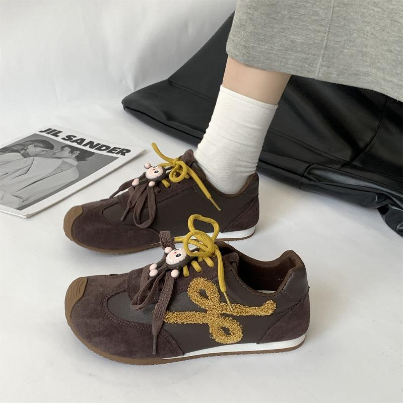 Lightweight women's new spring and autumn leather retro ugly cute tilted head color matching casual