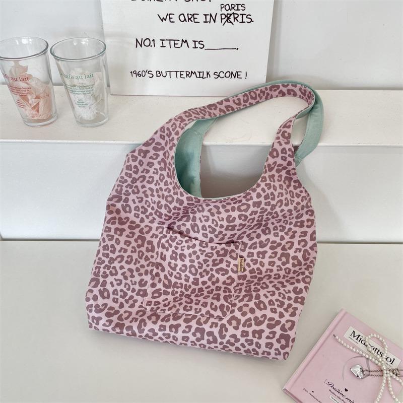 

Korean version of retro leopard print suede shoulder bag fashion high sense early autumn doublesided back tote bag women