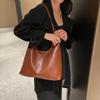 New Solid Color Plutonium Western Style Buckle Shoulder Bag for Women Hot Sale Simple Fashion Soft Simple Travel Bag
