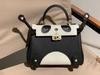 New Genuine Leather Women's Bag Head Layer Leather TOGO Leather Shattered Dimension Cartoon Graffiti Smiling Face Doll Women's Bag