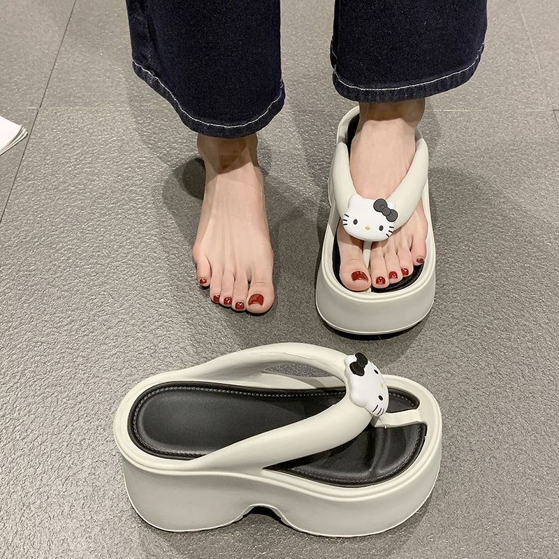 2025 sommar ny bär mode högt värde internetkändis flip-flops mångsidiga tjock botten höjdhöjande fot strandtofflor