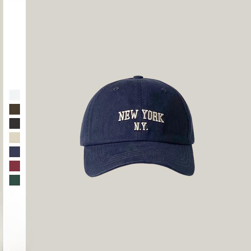 Female Baseball Cap Embroidered Soft Top Showing White Face with Small Navy Blue Baseball Cap for Women
