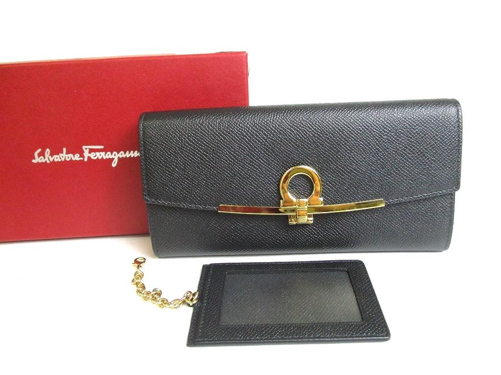 

Справжній довгий гаманець із чорною шкірою Salvatore Ferragamo Gancini із золотим H/W клапаном №a429 відремонтований