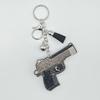 Fashion Rhinestone Gun Keychain with Tassel Pendant - Trendy Bag Accessory