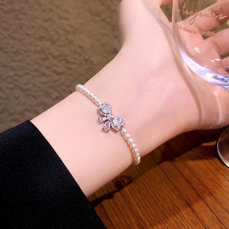 Elegant Pearl & Diamond Beaded Bow Bracelet - Chic, Versatile, and Luxurious Hand Jewelry