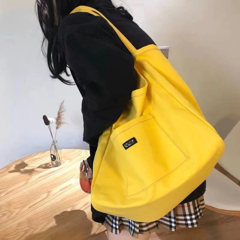 Nische einfarbige Canvas-Tasche Tasche 2025 neue koreanische Version Ins-Stil Umhängetasche einfache lässige große Kapazität Tragetasche