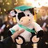 Plush Graduation Cow Toy Soft Stuffed Animal with Graduation Cap and Sash Holding Diploma for Graduation Celebration Gift