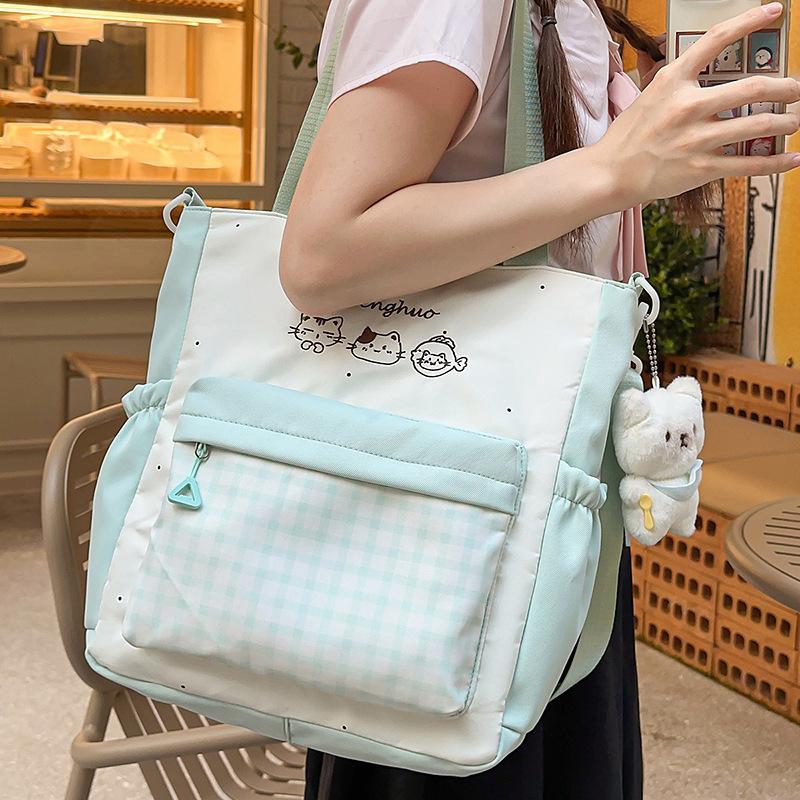 Neuer, hochwertiger, frischer und süßer, bonbonfarbener Dopamin-süßer Rucksack, leichte Kosmetiktasche für Mittelschüler