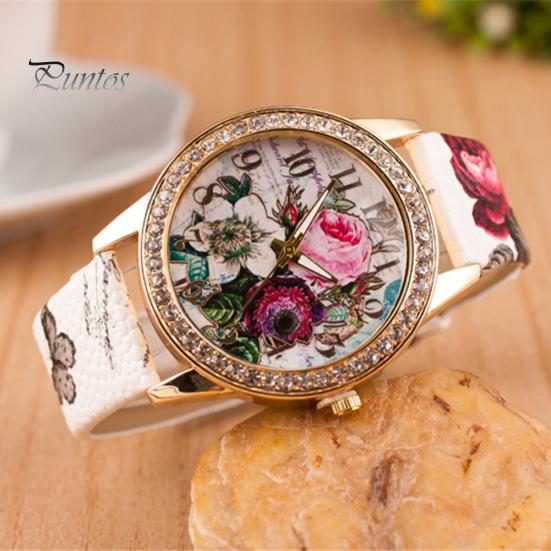 Orologio da polso da donna al quarzo con quadrante rotondo intarsiato di strass a forma di fiore e cinturino in ecopelle