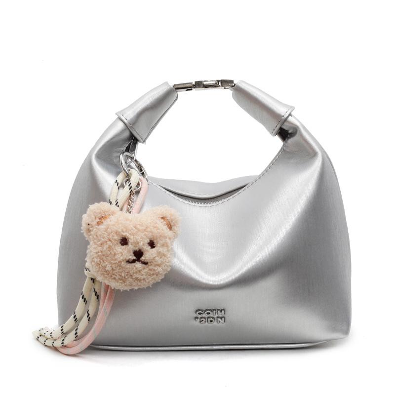 Korean version of fashionable simple high-quality textured wrist dumpling bag niche casual versatile commuter messenger crescent bag women