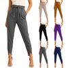 Pantalon plissé de couleur ajusté pour femme avec poches et ceinture à nouer pour un usage quotidien décontracté
