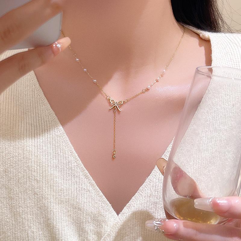 Жемчужная кисточка-бант ожерелье женская изысканная титановая сталь ключица цепь дизайн чувство сочетание