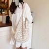 Beautiful flower hollow woven solid color tote bag, new large-capacity shoulder underarm bag, light and versatile bag