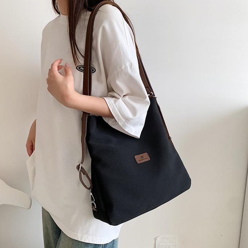 

Холщовая сумка-тоут Женская Высокой вместимости и Минималистичный Рюкзак в стиле Колледж Модная Универсальная Повседневная Сумка через плечо Кроссбоди 31x10x32cm чёрный