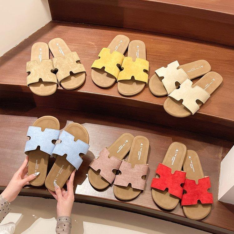 Lazy one-word slippers female outer wear summer flat-bottomed fairy style new with skirt seaside beach cool slippers