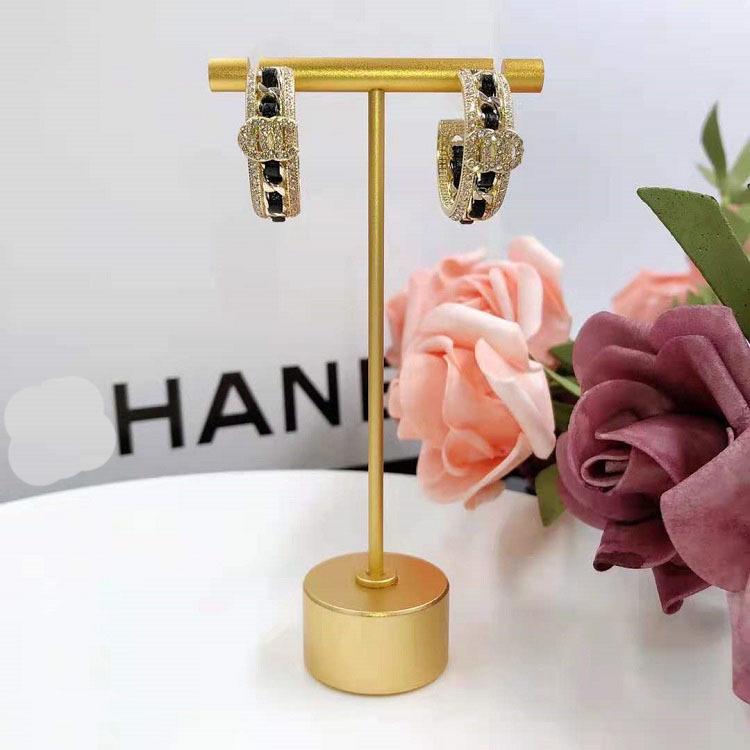 Kolczyki Xiangjia z podwójnym C ze skóry - Modny styl celebryty