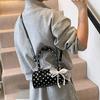 Niche polka dot bag 2025 new Mori sweet fashion bow foreign style versatile portable shoulder cylinder bag