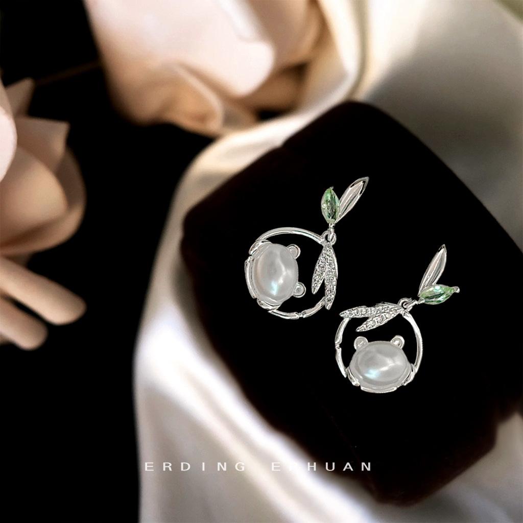 

Микро-инкрустированные цирконием новые китайские бамбуковые листья панда серьги литературный дизайн чувство национальный стиль полые свежие высококачественные серьги женские