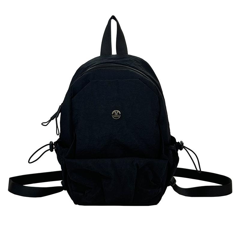 Schoolbag new solid color lightweight small backpack women's simple large capacity breast bag leisure travel commuting versatile portable small 