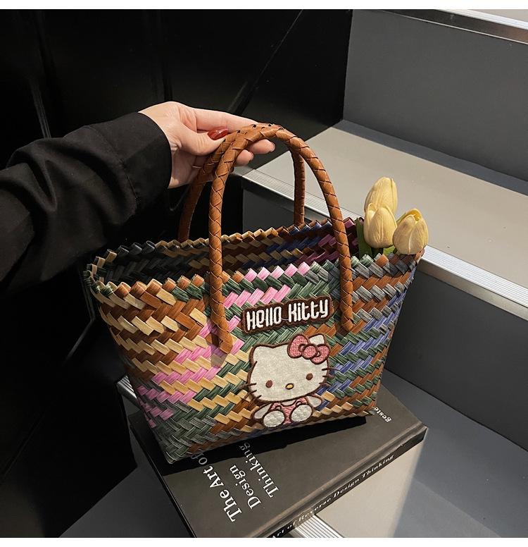 Cartoon KT Cat Rattan Beach Bag: Women's Summer Handheld Woven Basket for Seaside Holiday Commute